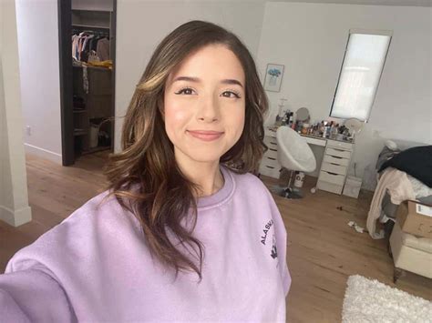 pokimane nsfw|Pokimane escapes ban and handed warning for NSFW content.